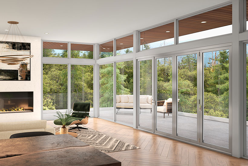 Large floor to ceiling glass patio doors and windows with grey frame