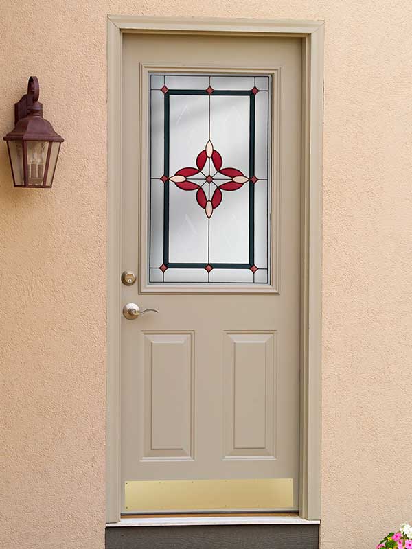 Tan entry front door with stained glass detail