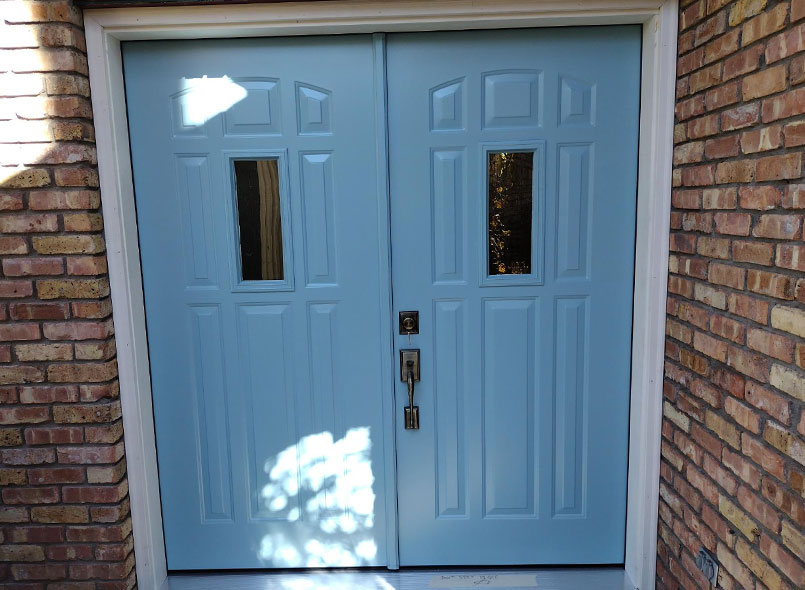 Blue french entry doors with center windows